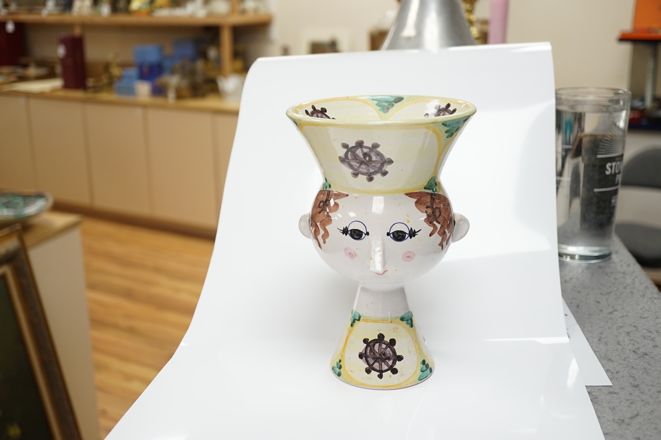 A Bjørn Wiinblad, Denmark vase in the form of a female head with large hat, 20.5cm